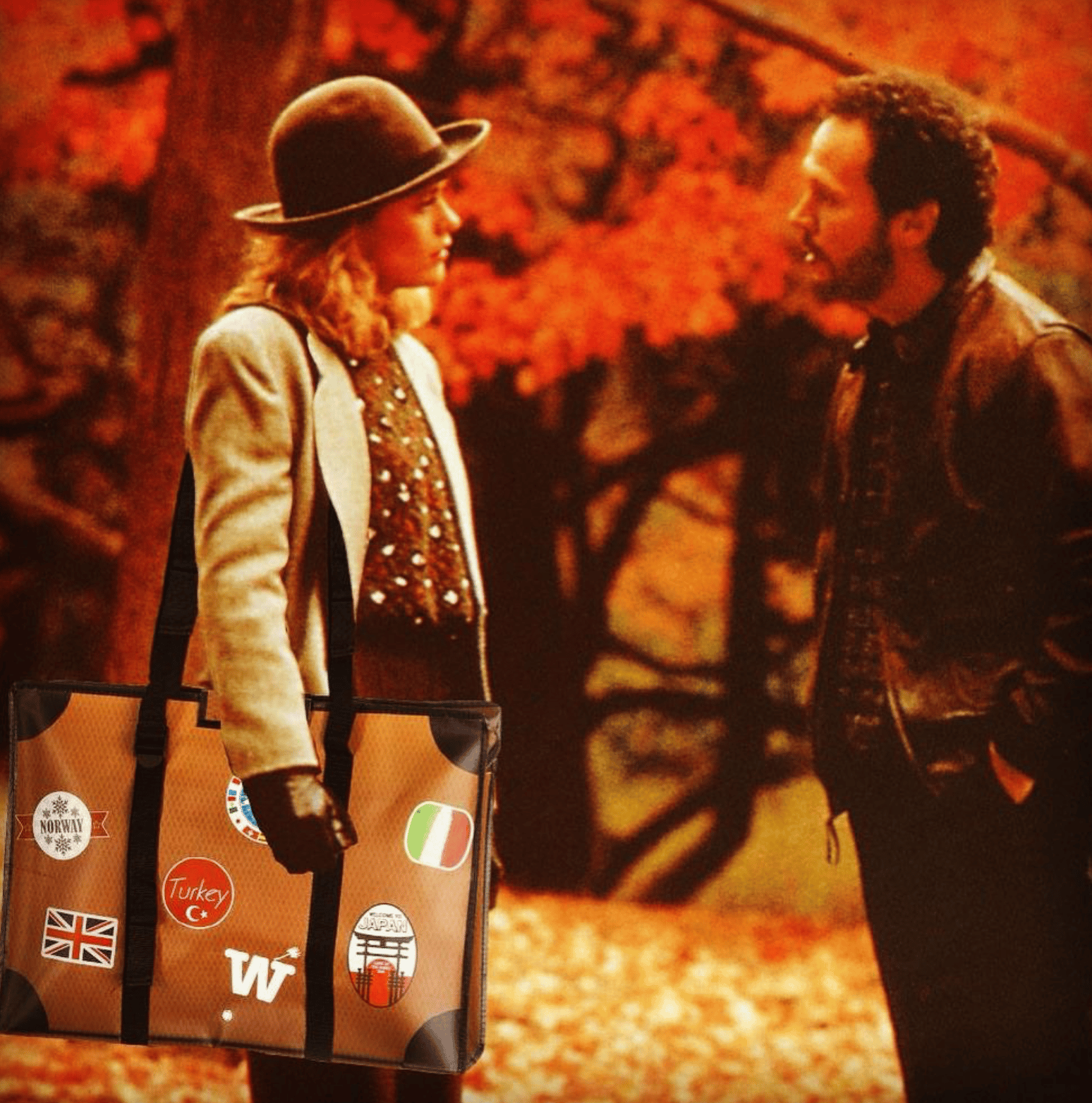 WISSHH Travel Bag in the vintage orange travel-stickers edition, on the road