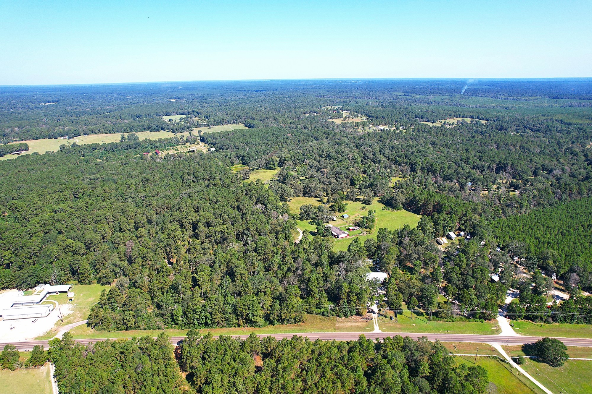 Aerial view of rural land and forested property for land mapping
