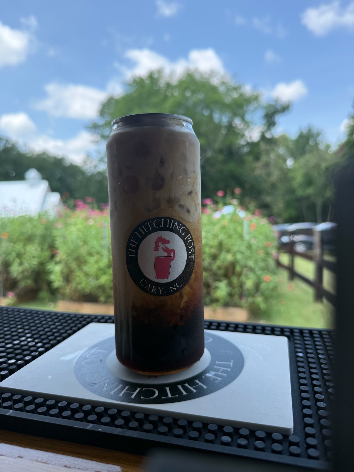 Close-up of Hitching Post branded cup — craft cocktail bar mobile service Cary NC Triangle events