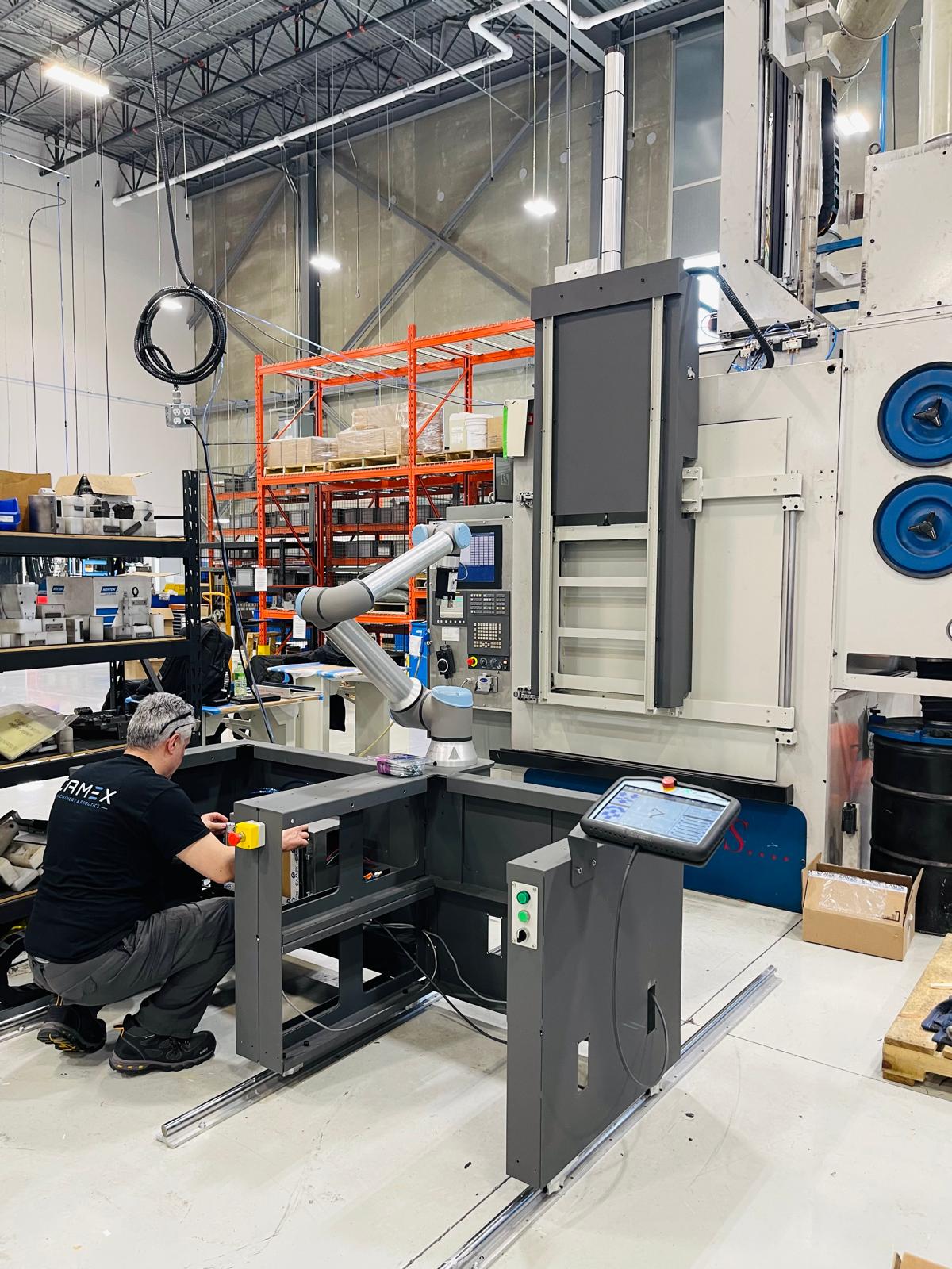 Camex technician commissioning the cobot system