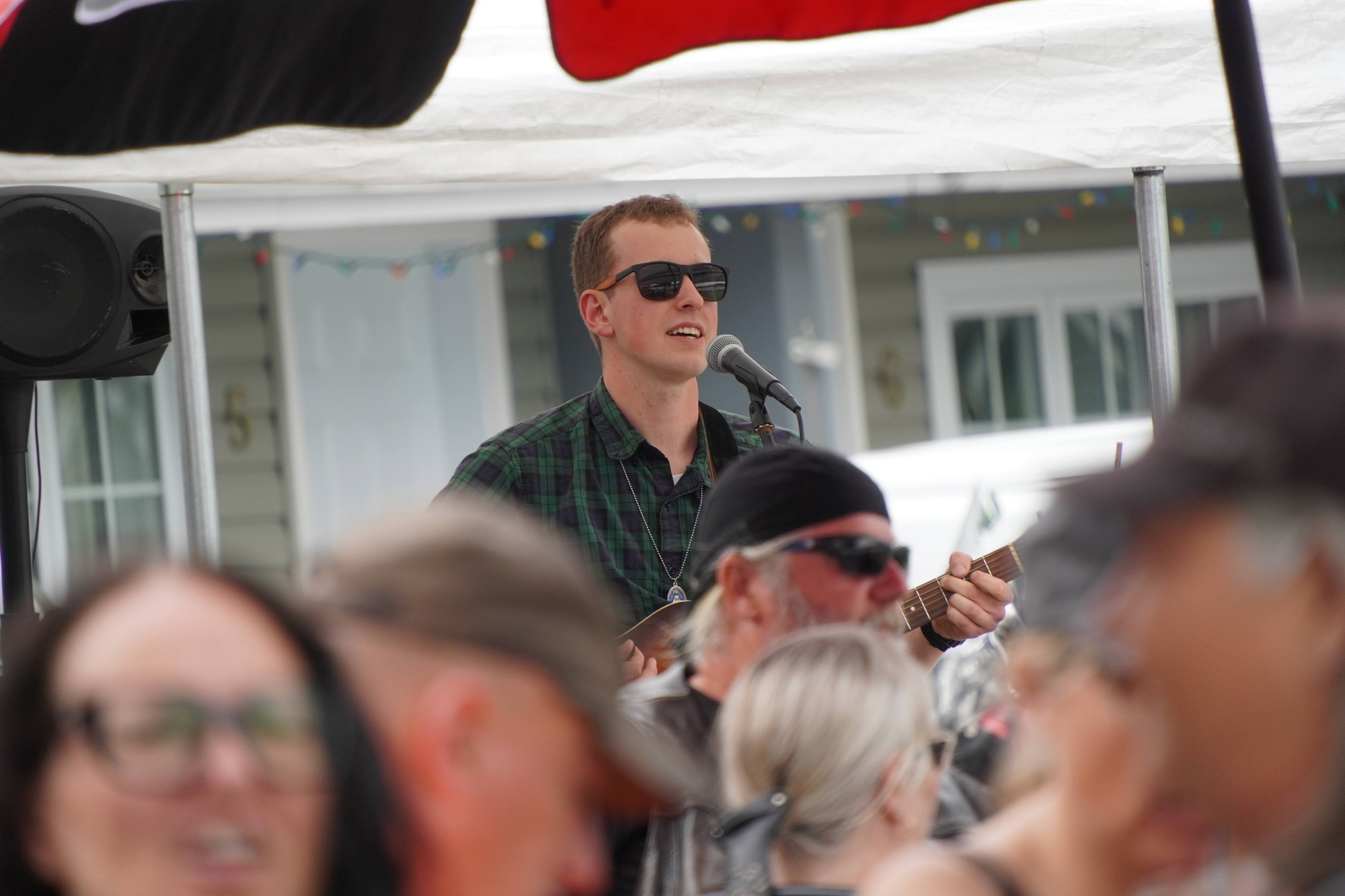 Conrad Daniel performing live at an outdoor event