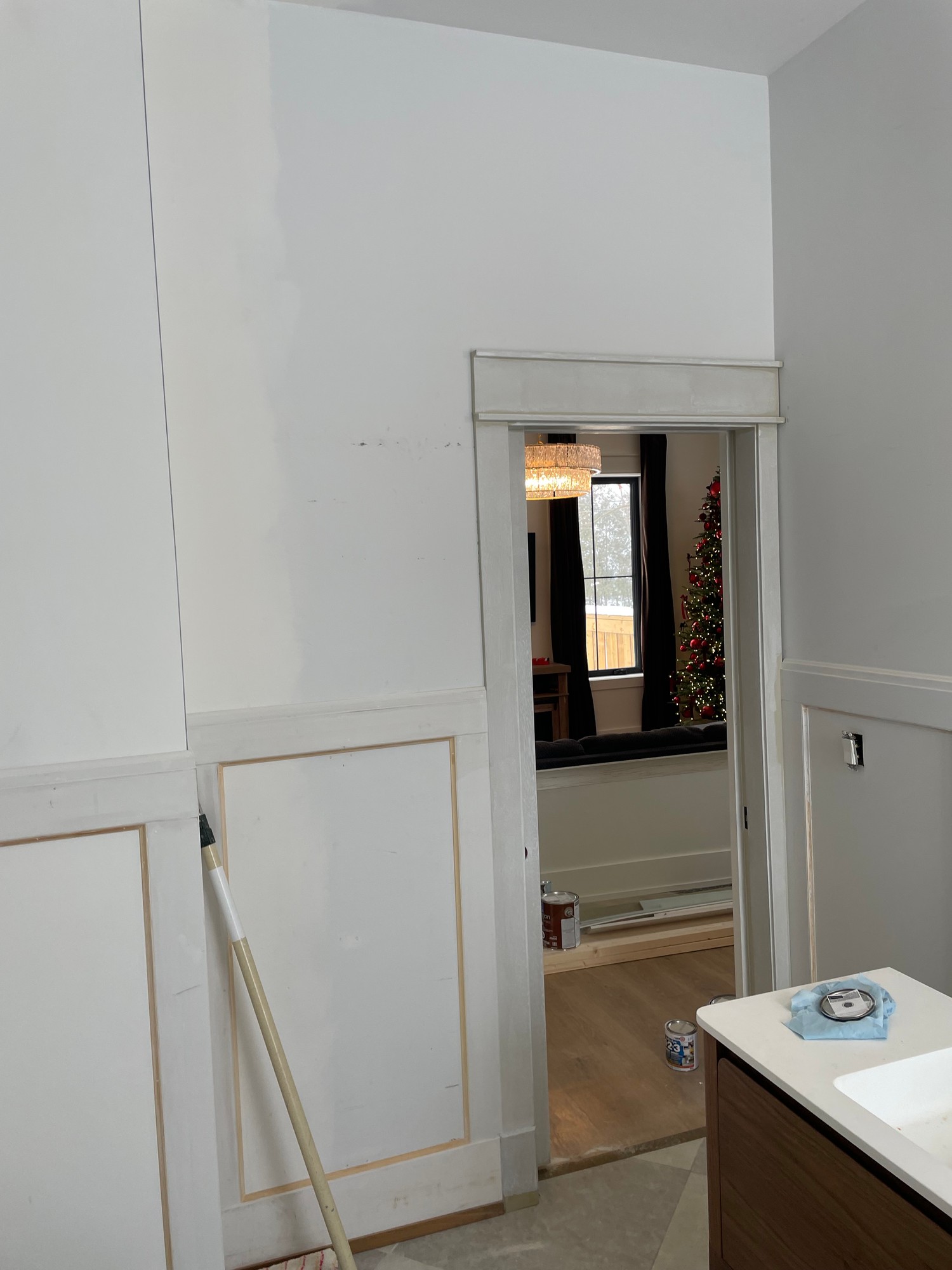 Professional painter rolling interior wall