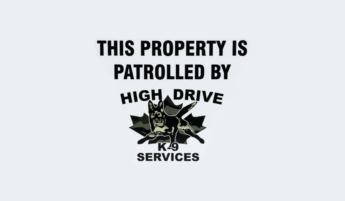 High Drive K-9 security patrol sign on facility fence