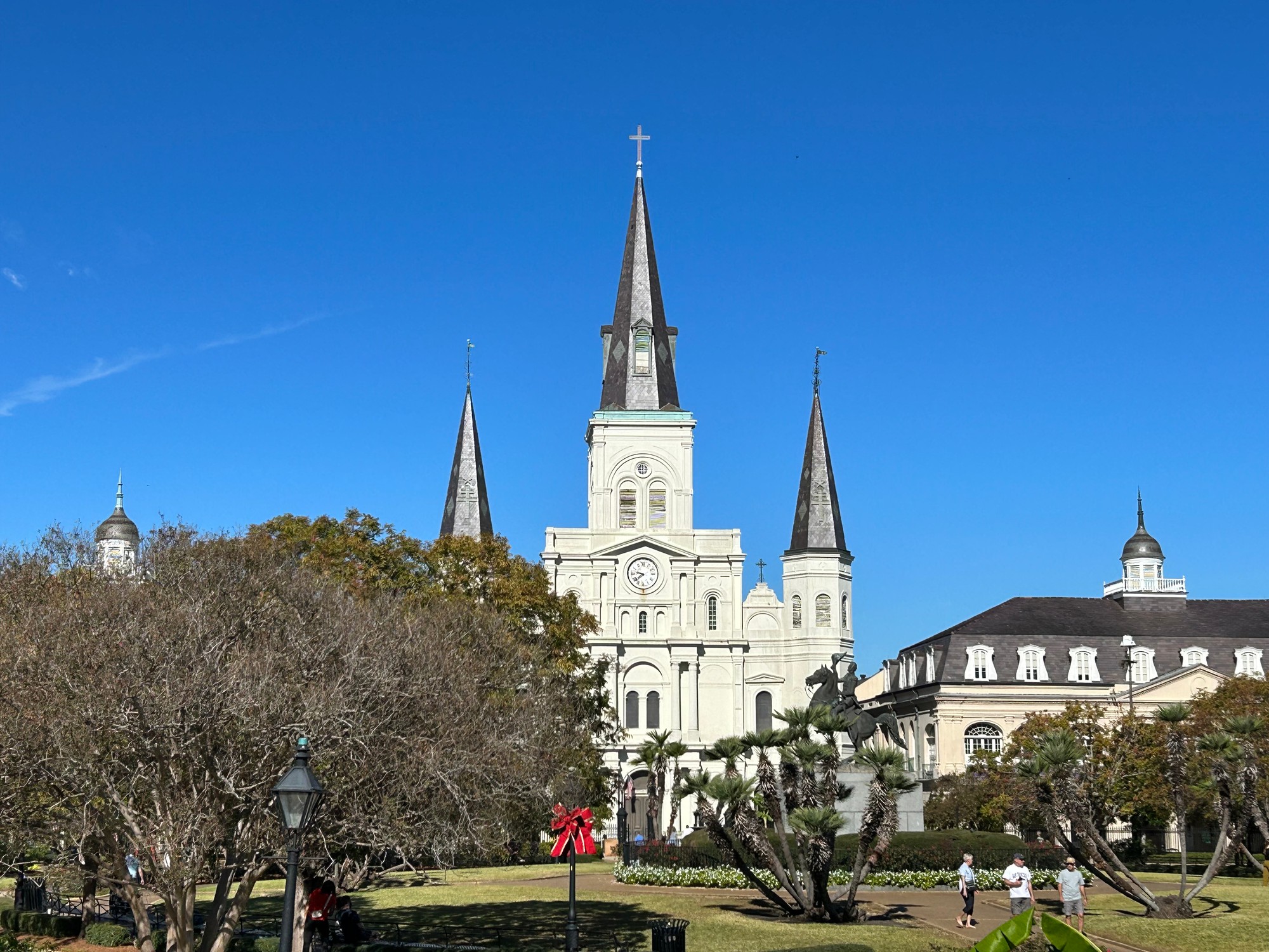 St. Louis Cathedral and Jackson Square in the New Orleans French Quarter on a clear blue-sky day