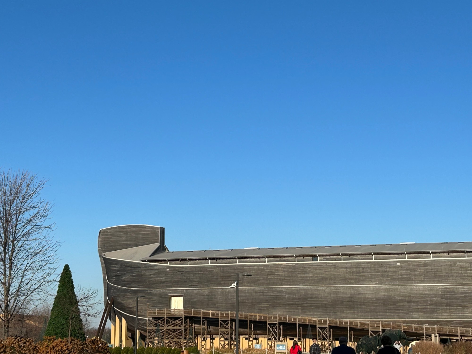 The towering bow of the Ark at the Ark Encounter, with the entrance ramp below