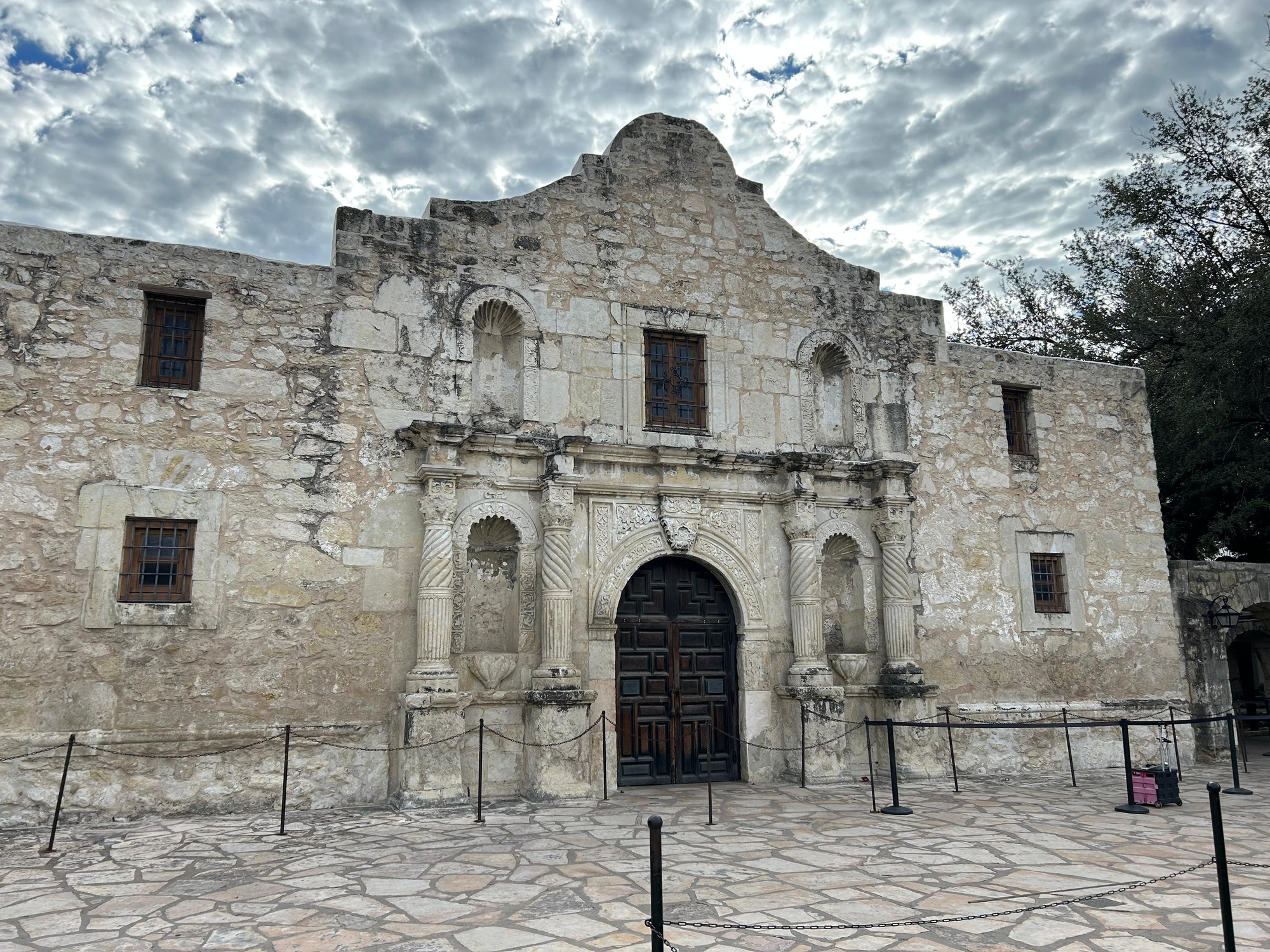 The historic Alamo in downtown San Antonio under a dramatic sky