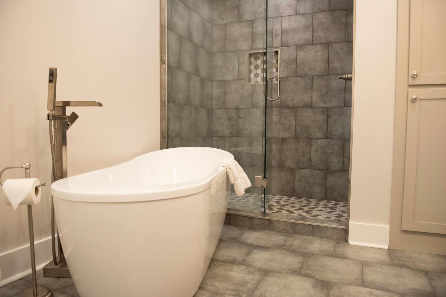 Luxury bathroom with soaking tub and glass shower