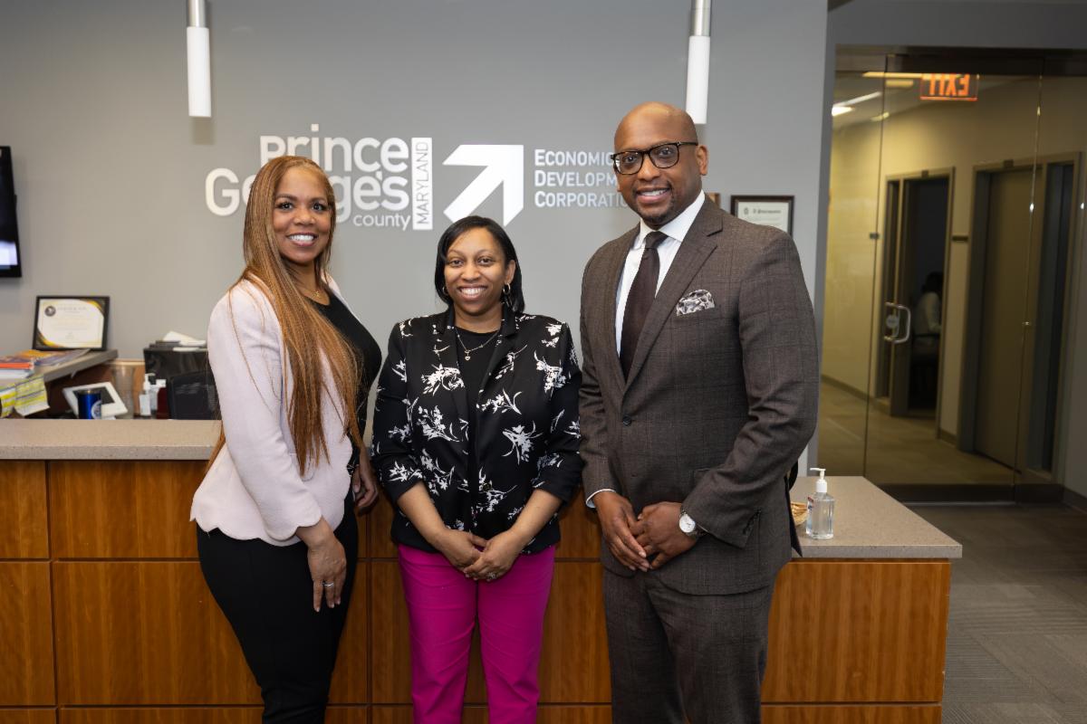 Michelle Braxton (CEO), Alexis Allen-Shorter (PGCEDC), and Mark Young (COO) at the Prince George's County Economic Development Corporation