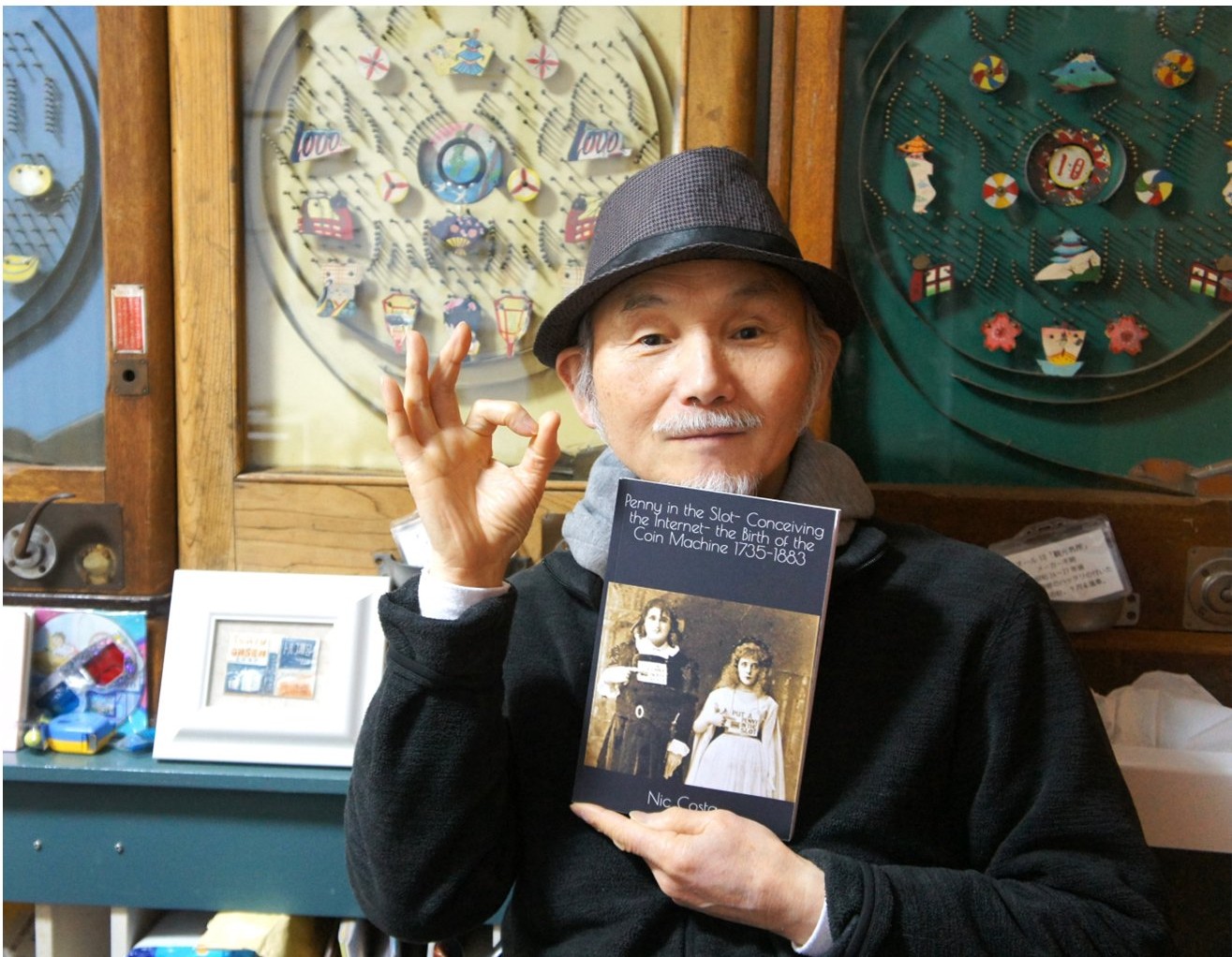 Kazuo Sugiyama, Director and Author, Pachinko Museum, Japan, with an early edition of Conceiving the Internet
