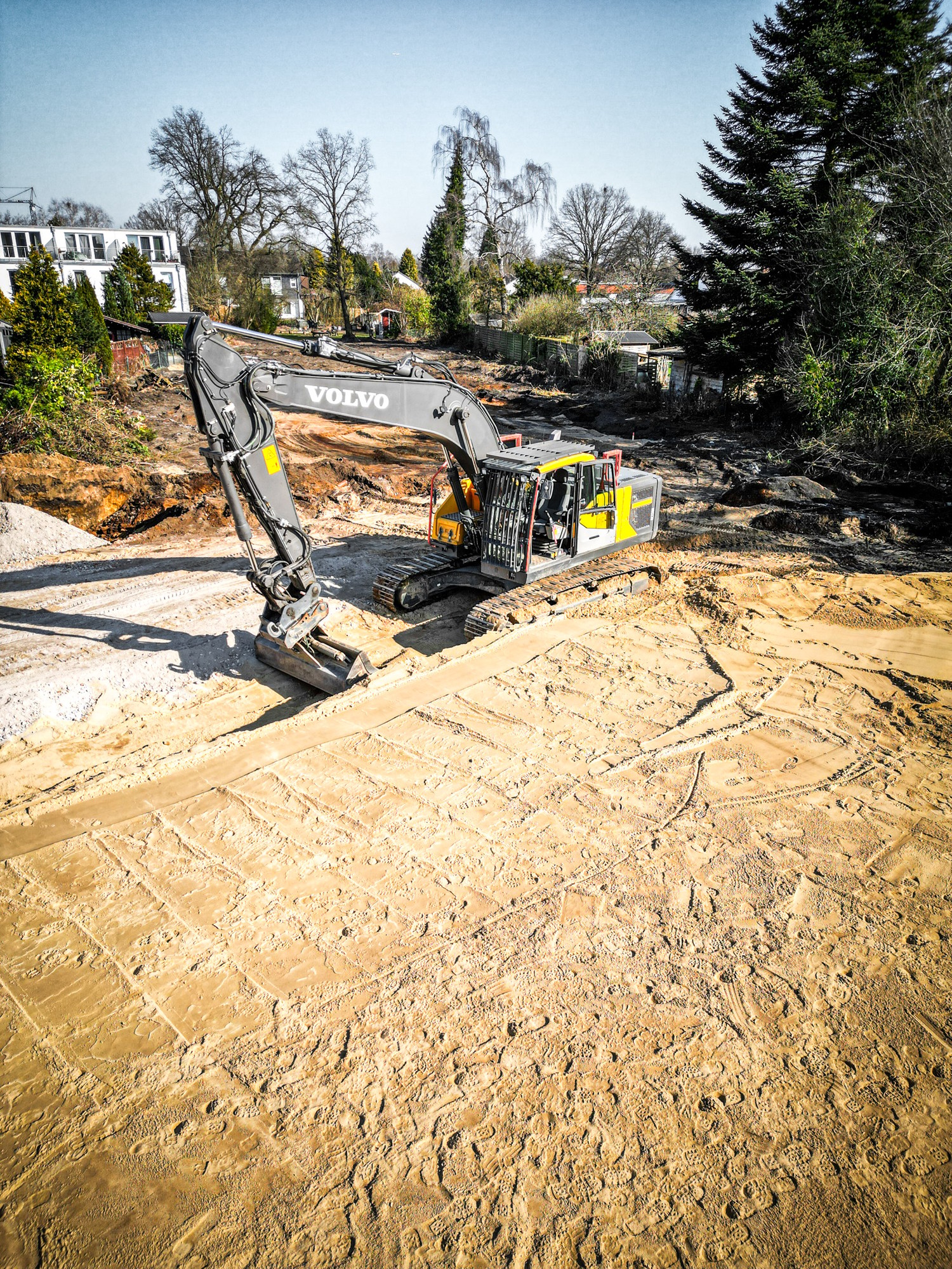 Sandplatte für 16 Reihenhäuser