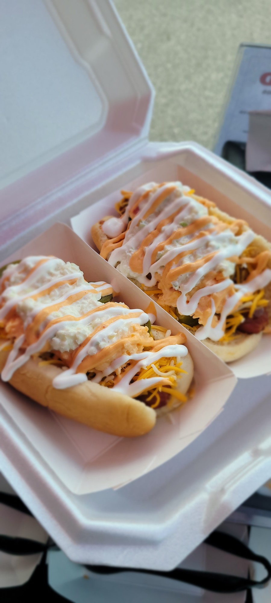 Hot Dog Ninja loaded hot dogs in a to-go container