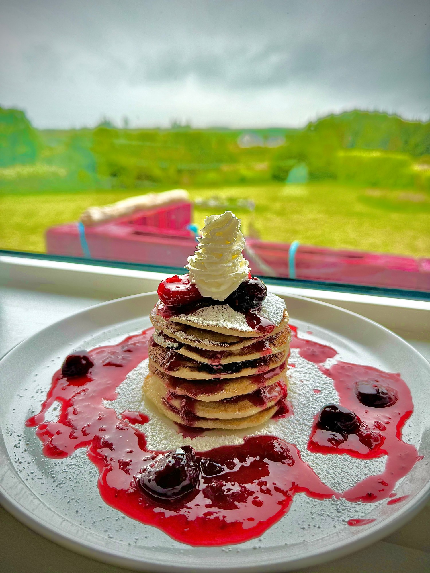 Puffin B&B homemade pancakes with berry sauce and cream
