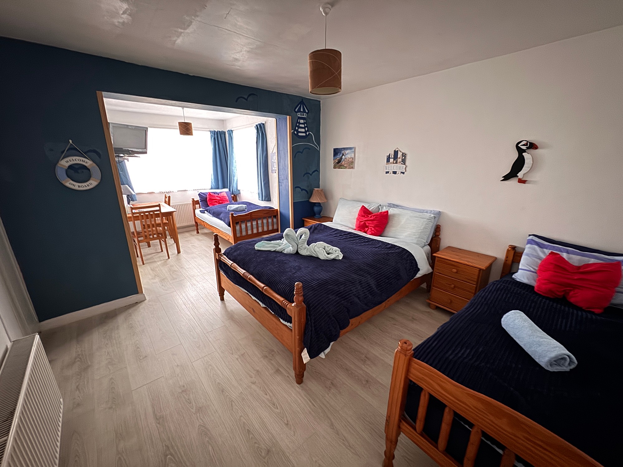 Puffin B&B family room with nautical theme, double bed and twin bed