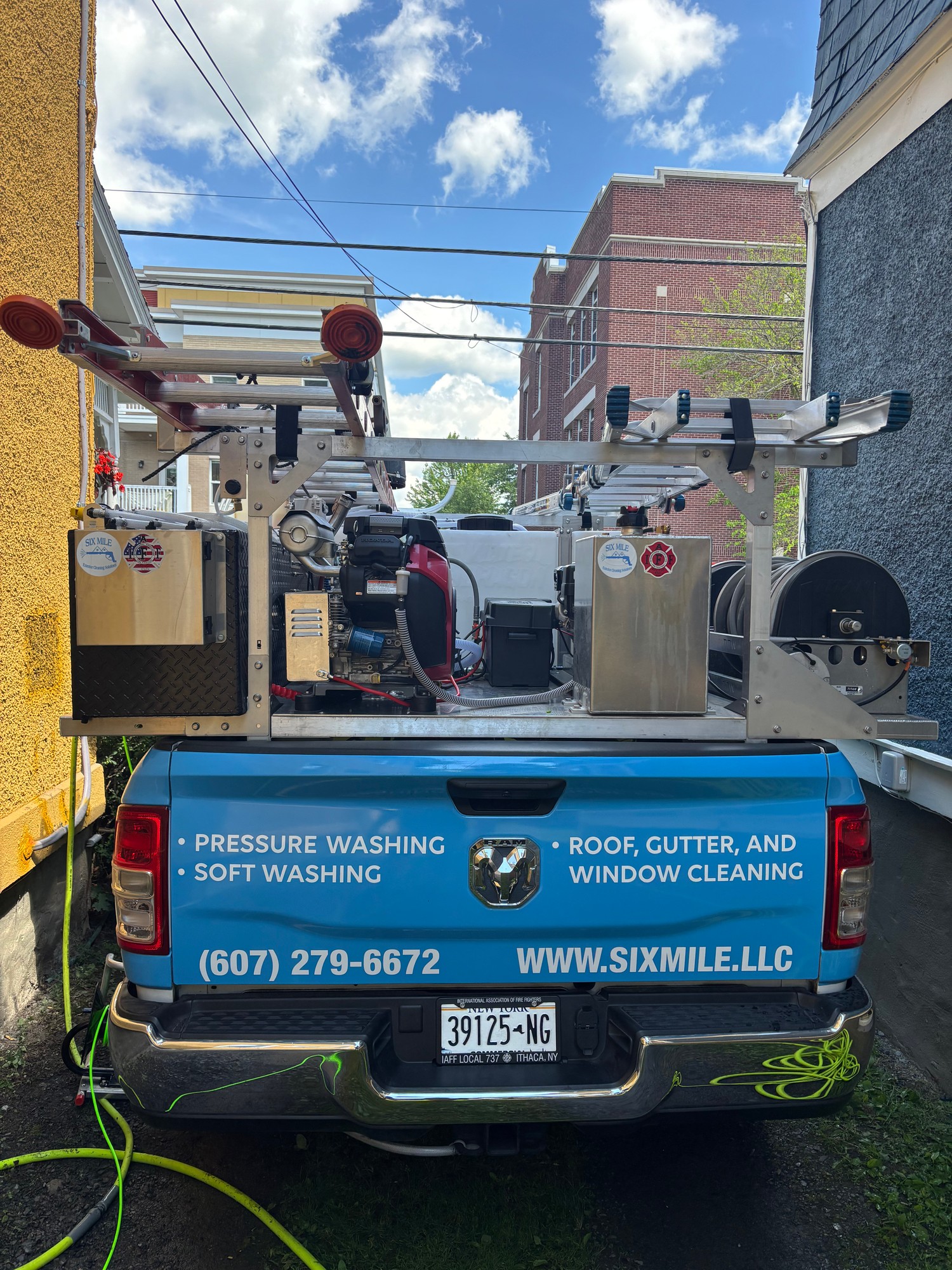 Six Mile branded truck with professional cleaning equipment