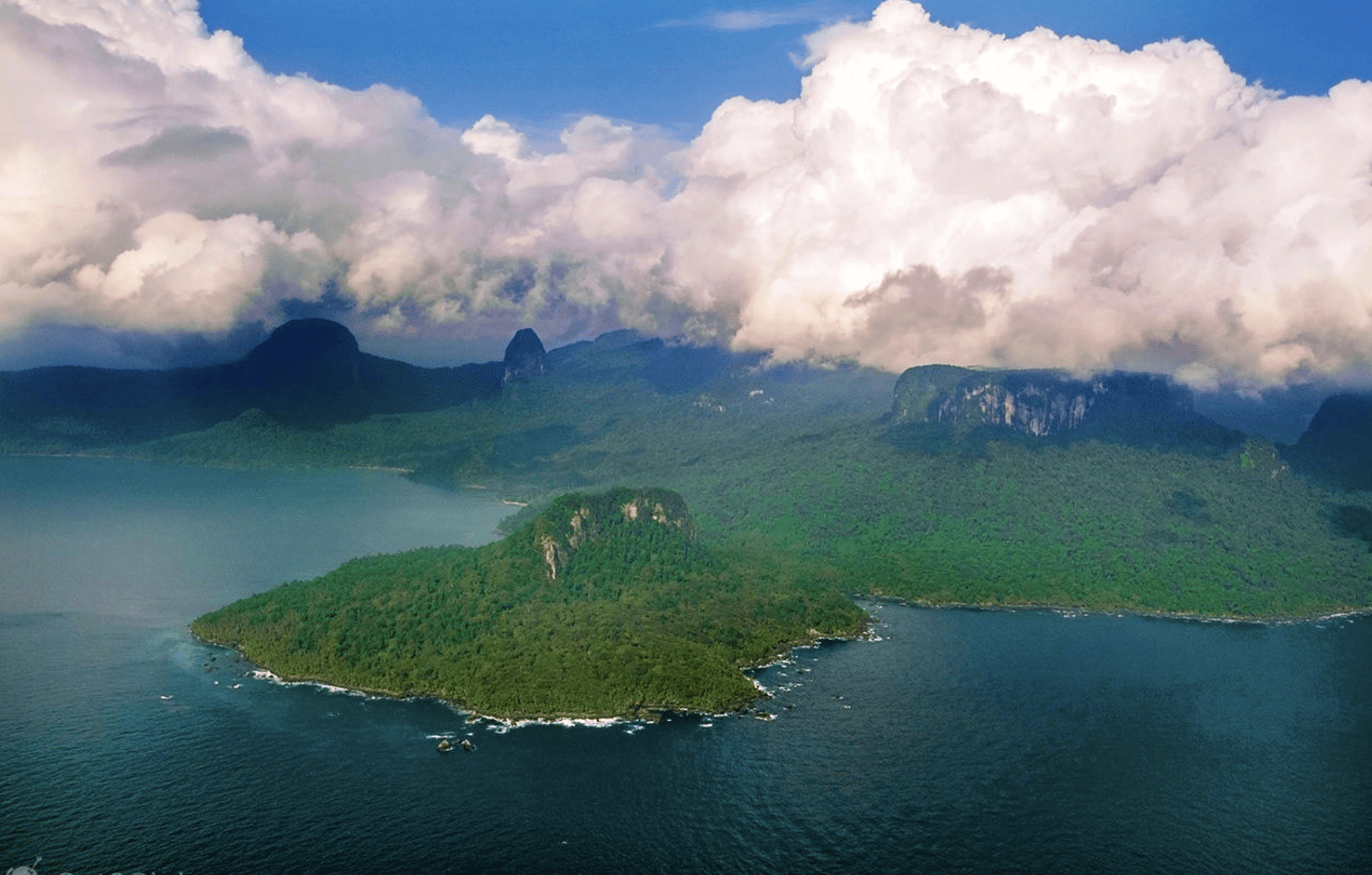 Forested coastline and volcanic peaks of Príncipe