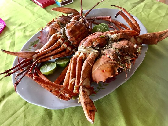 Santola crab served with lime at a local restaurant in São Tomé