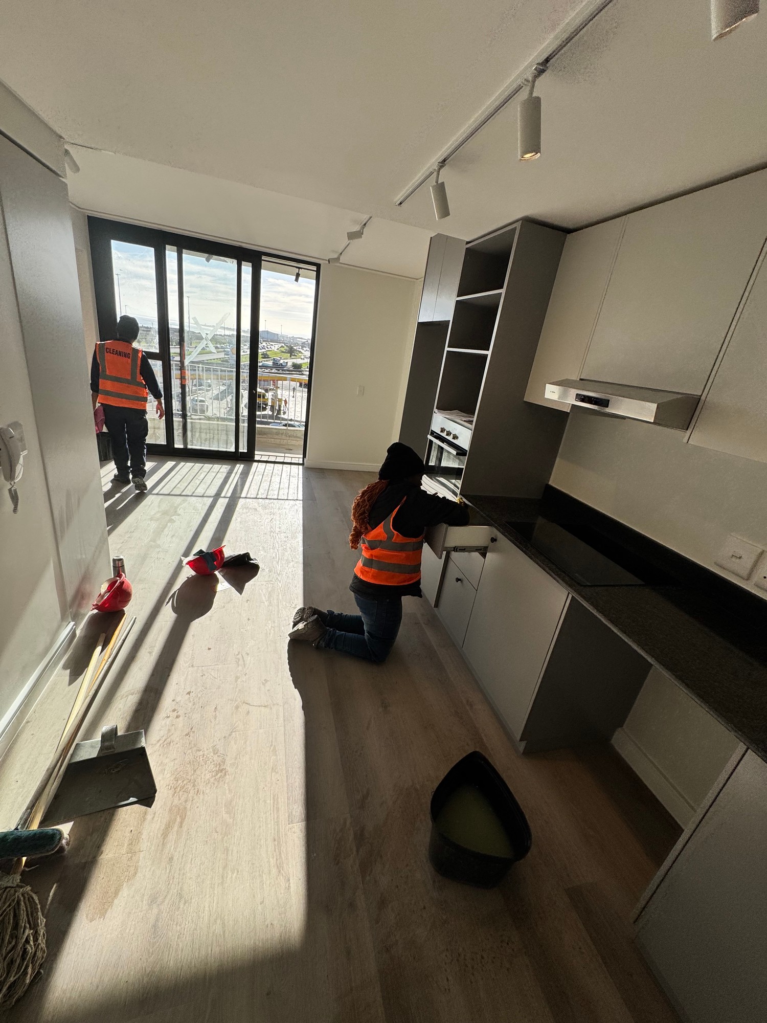 Team Apartment Clean in Progress