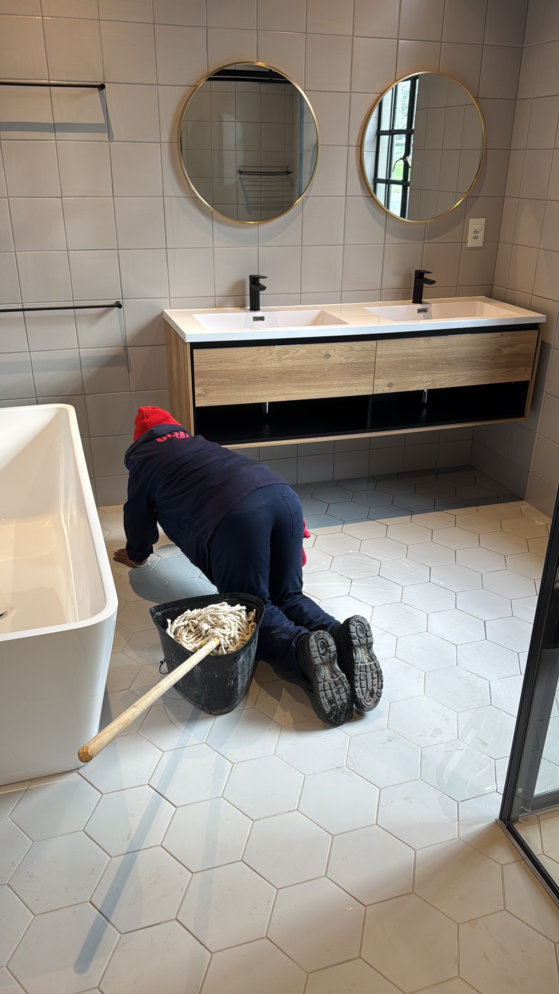 Team Mopping Luxury Bathroom