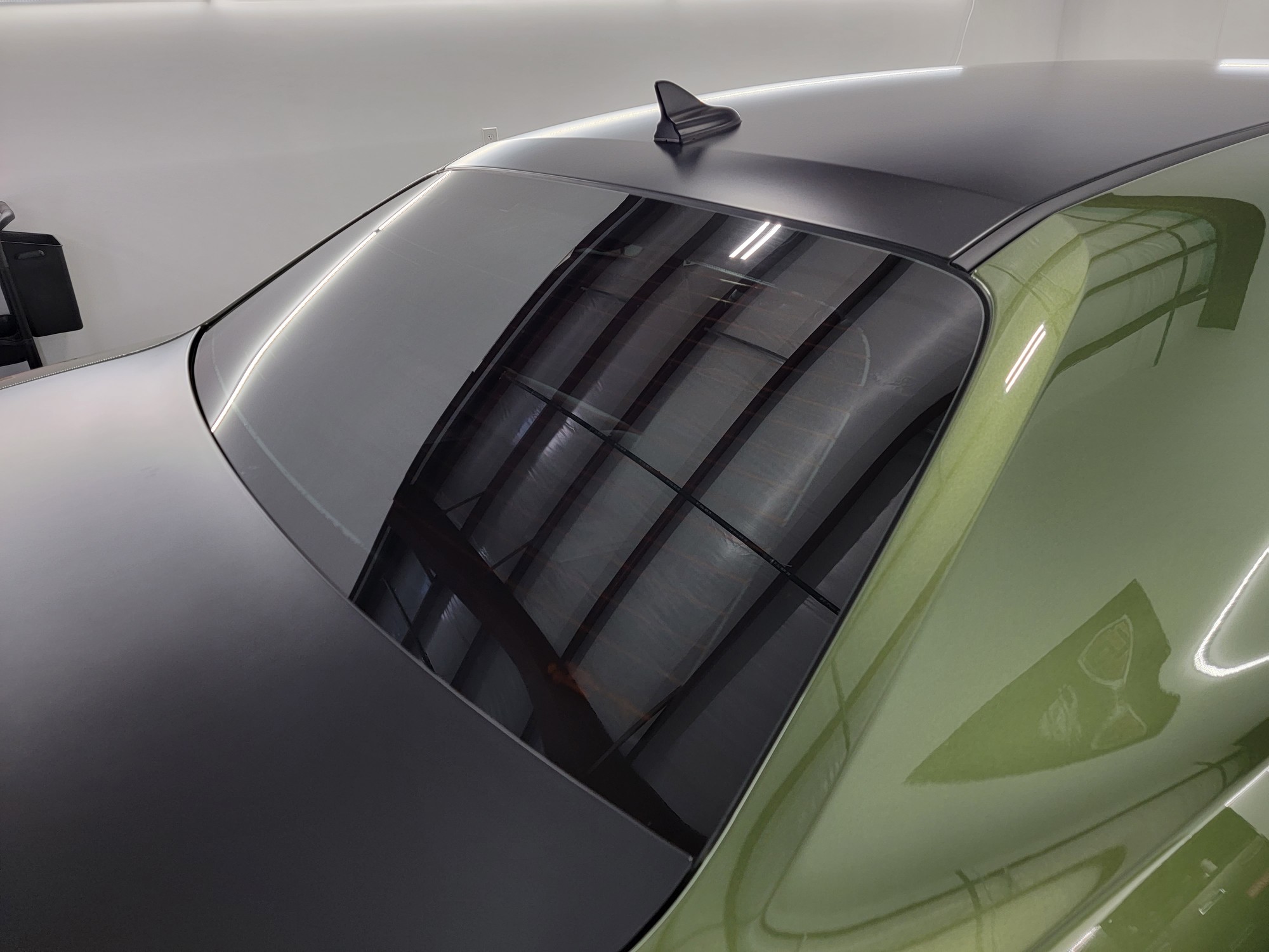 Window tint installed on a Dodge Challenger at Revival Autoworks