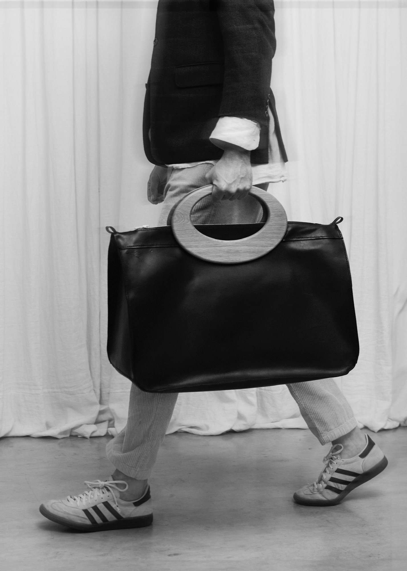 LINFIN hand-stitched bag with sculptural oval silhouette