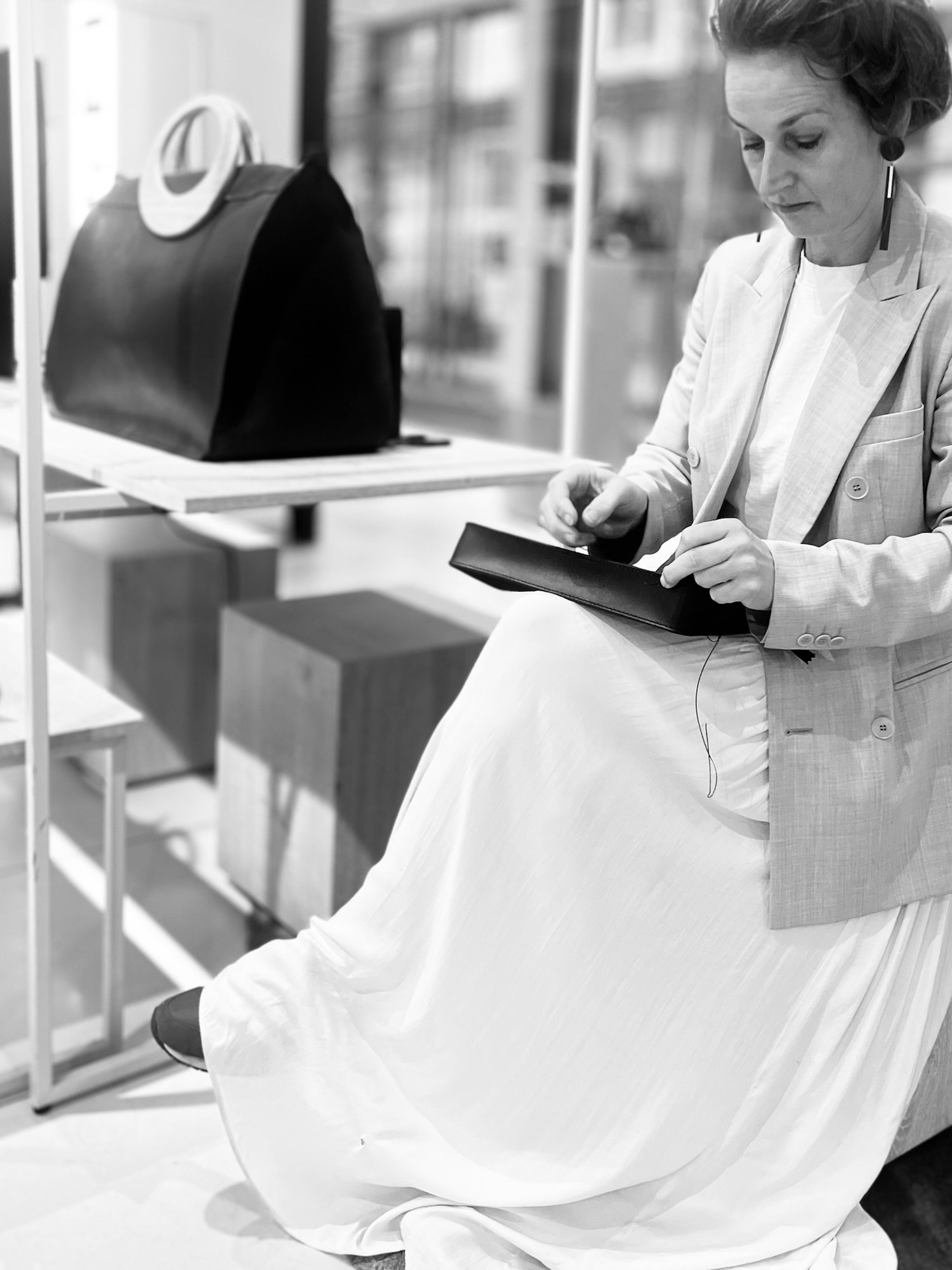 Hand-stitched LINFIN leather bag with sculptural silhouette