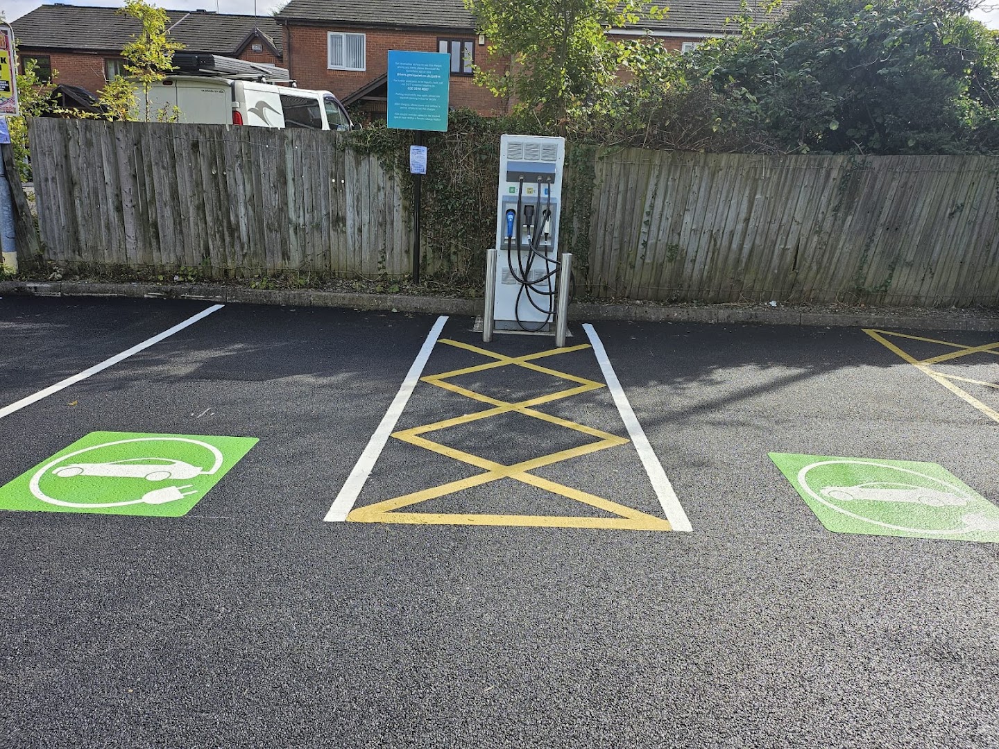 EV charging bays with hatched keep-clear