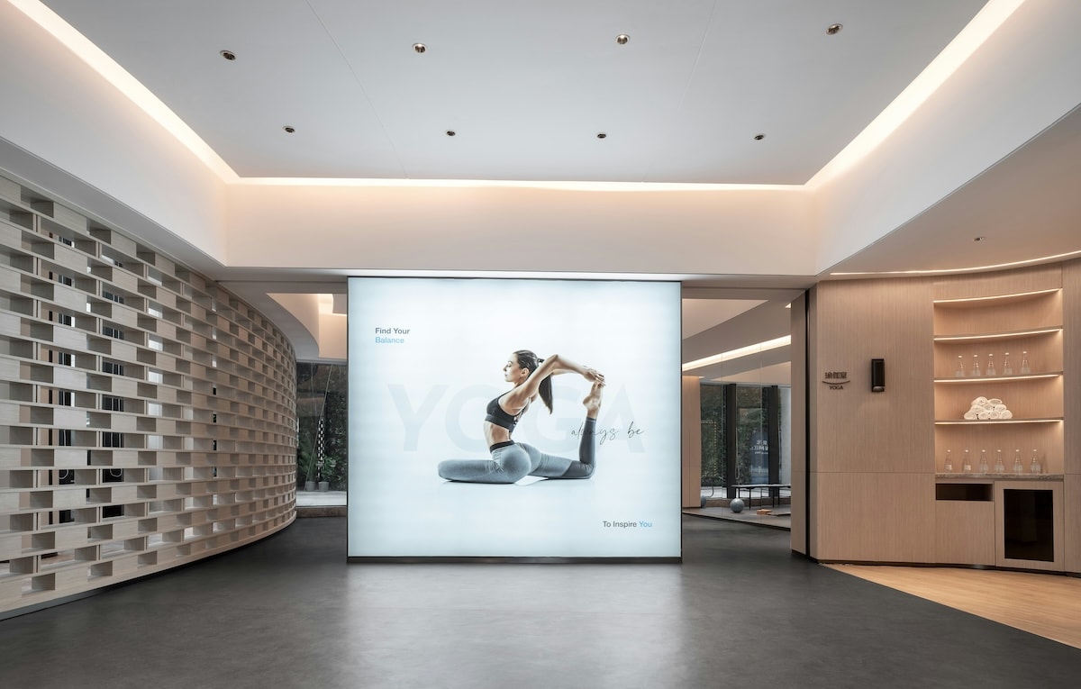 The entrance hall, lit by a floor to ceiling lightbox