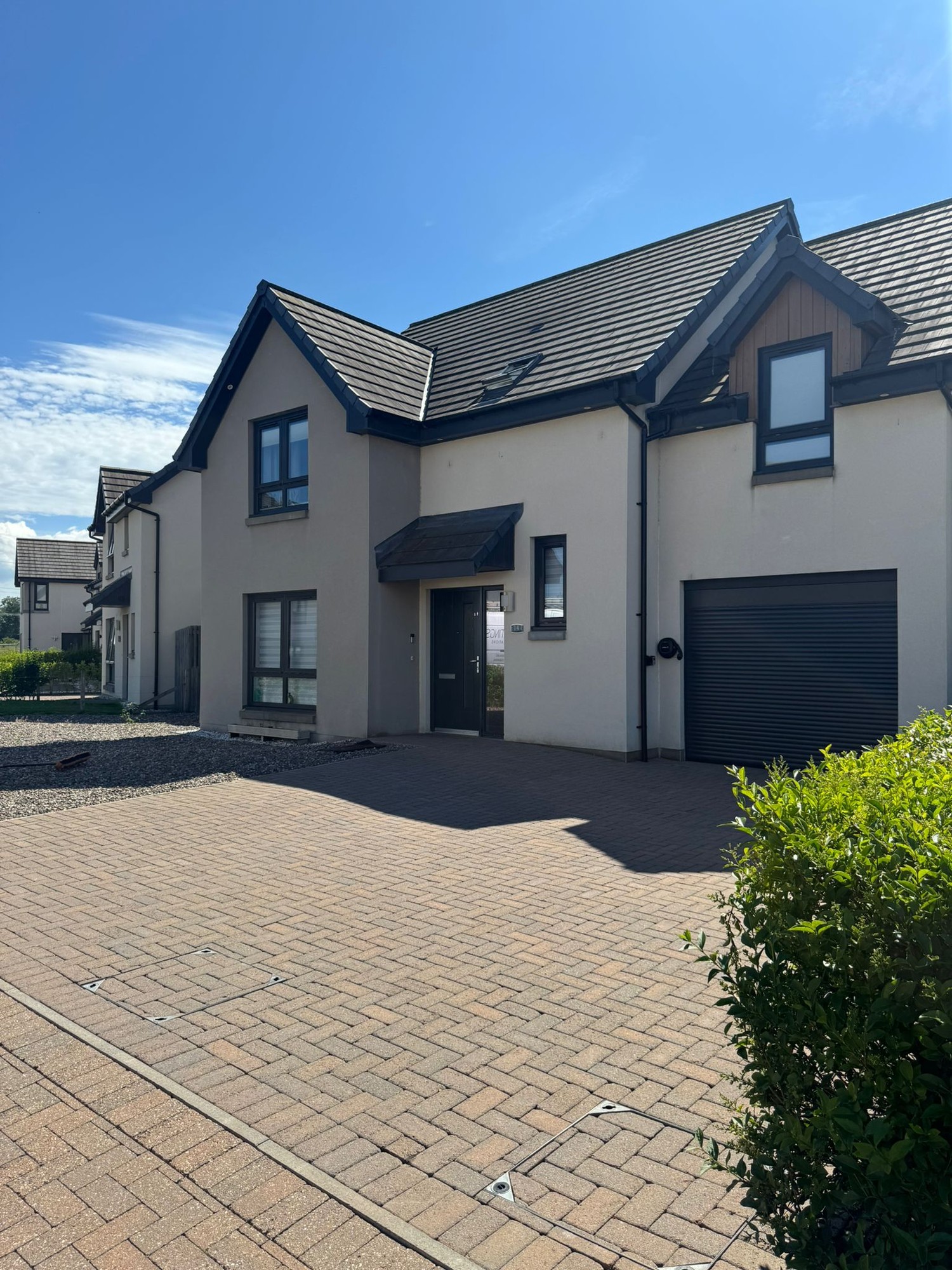 Faded, worn block paving driveway before professional driveway coating — Perth