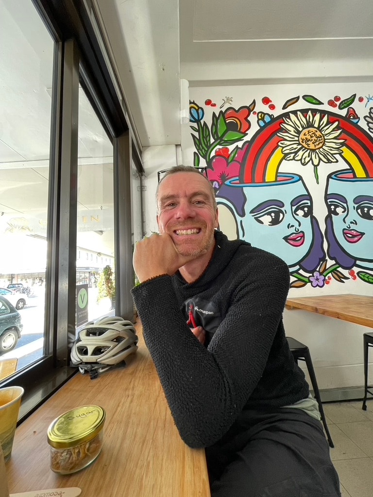 Chris York at a cafe