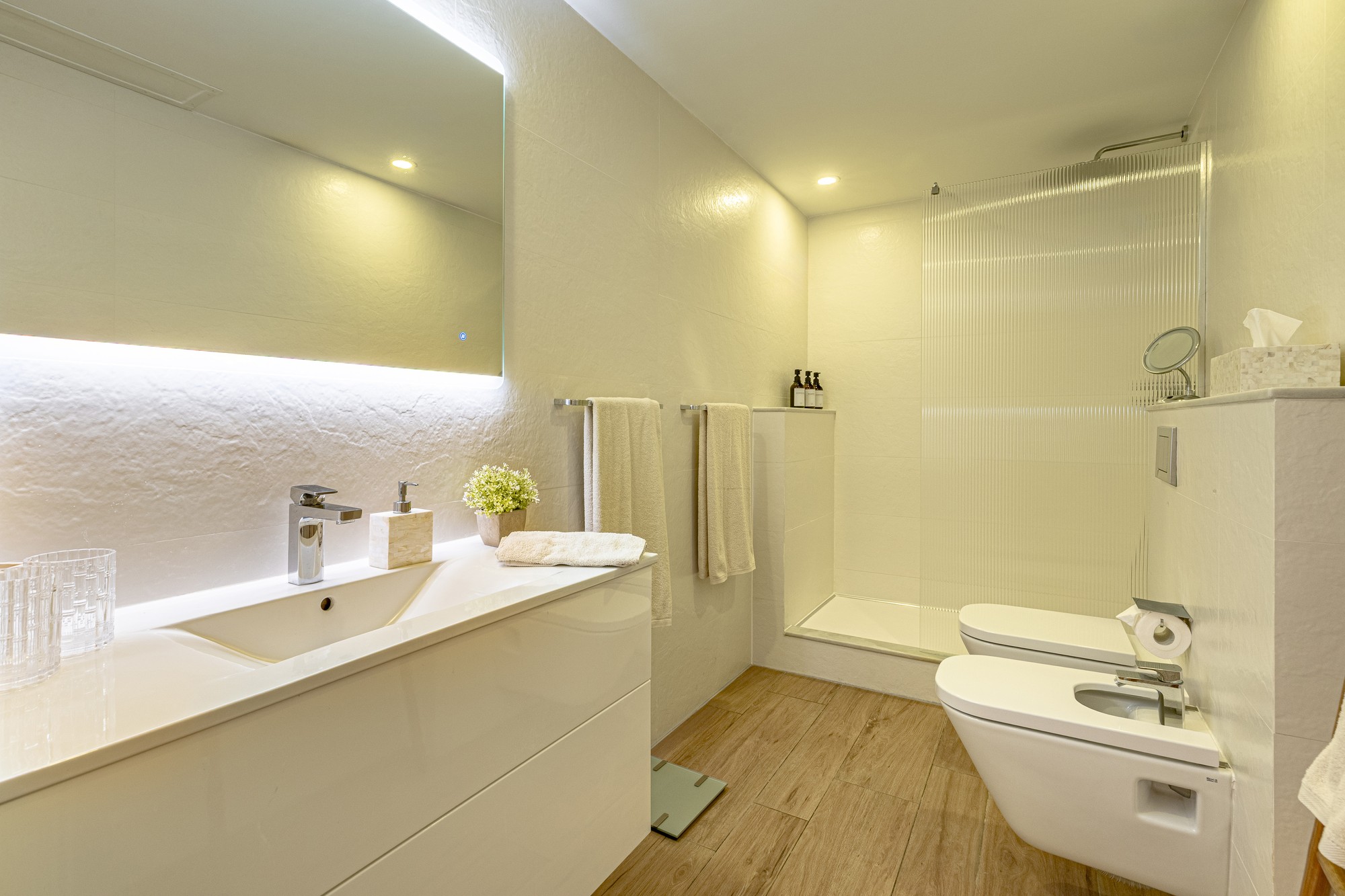 Bright bathroom with walk-in shower