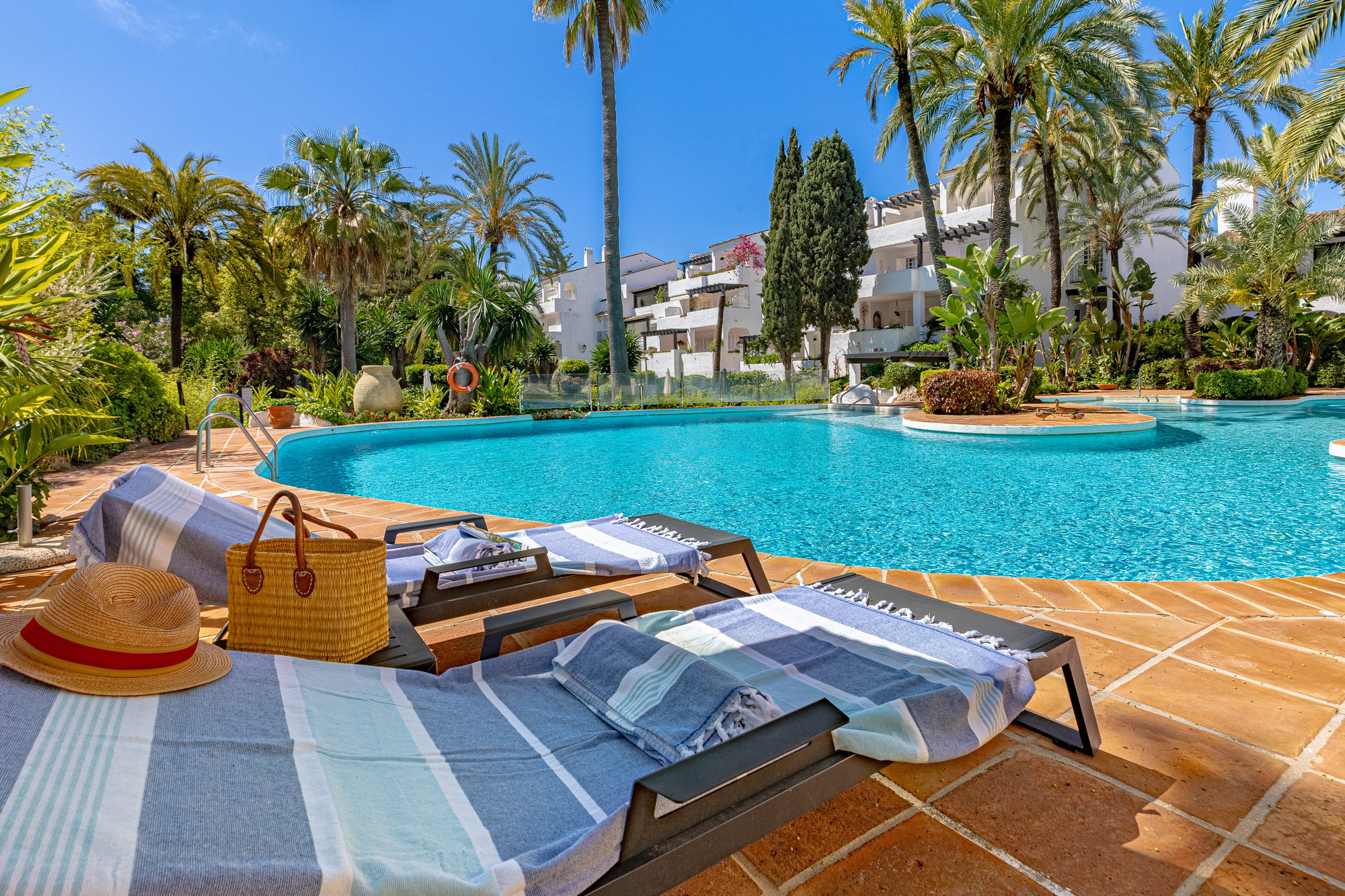 Pool and tropical gardens at Puente Romano