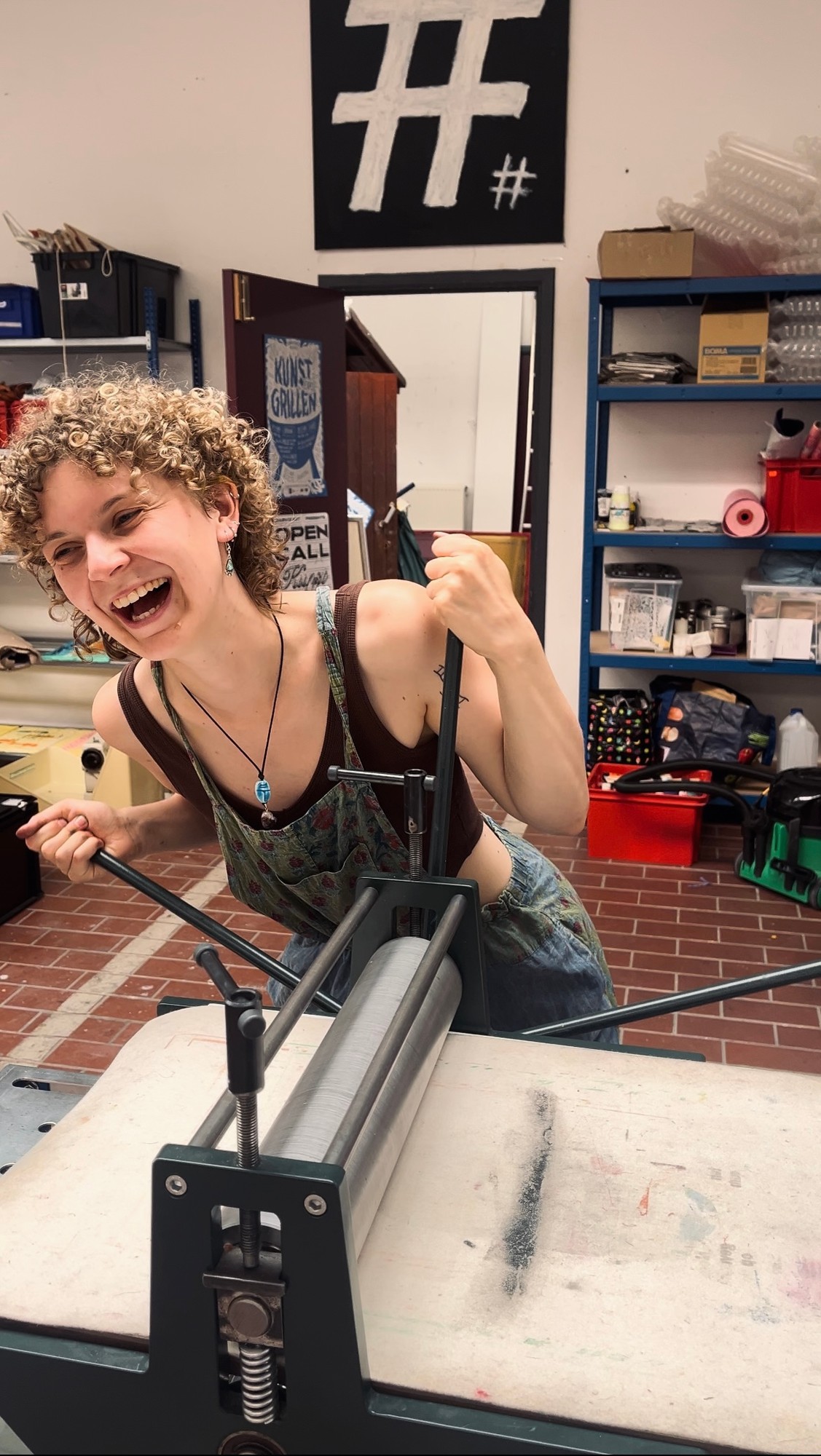 Kaat Wouters in her studio with a printing press