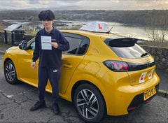 Gai Lau passed their driving test