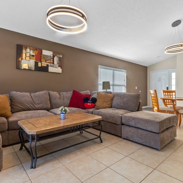 Living room with 65-inch smart TV and Love Sac sofa