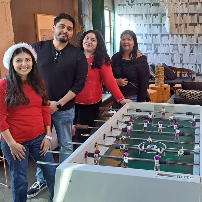 Coast Care team members enjoying time together at the company holiday party