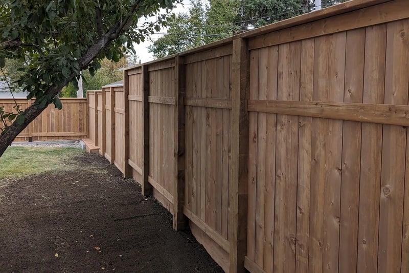 New cedar privacy fence installation in Calgary backyard