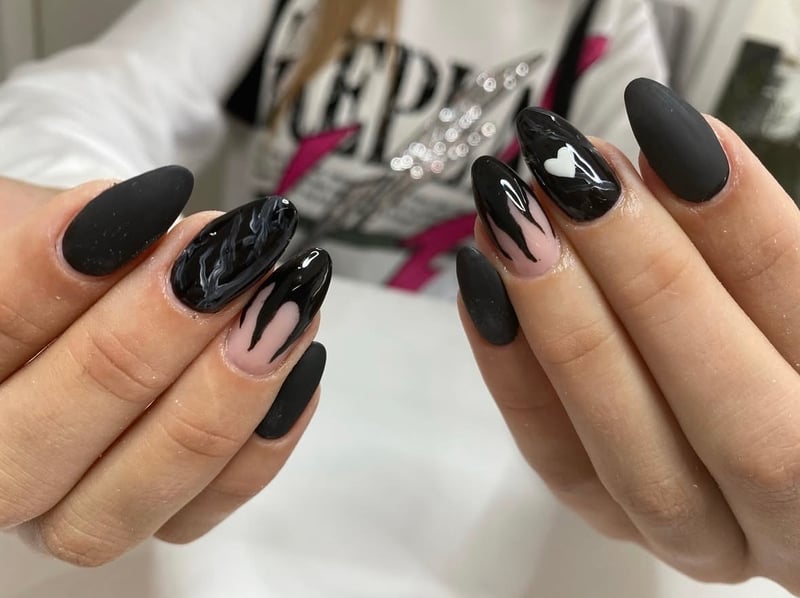 Matte black nails with white heart