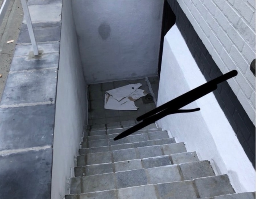 Vóór — keldertrap Knokke-Zoute: verweerde betonnen treden
