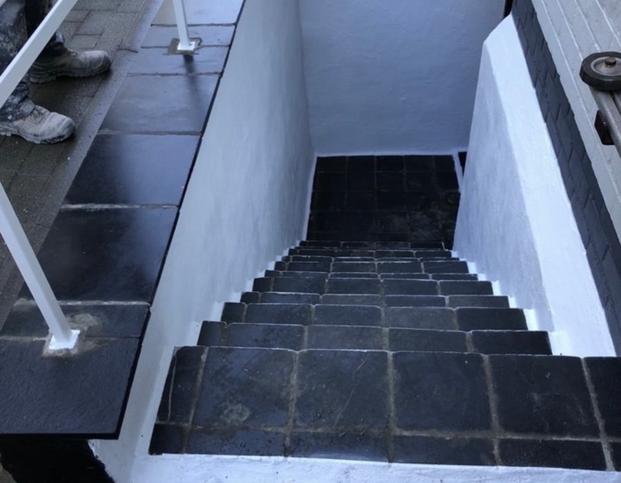 Na — keldertrap Knokke-Zoute, bovenaanzicht naar beneden