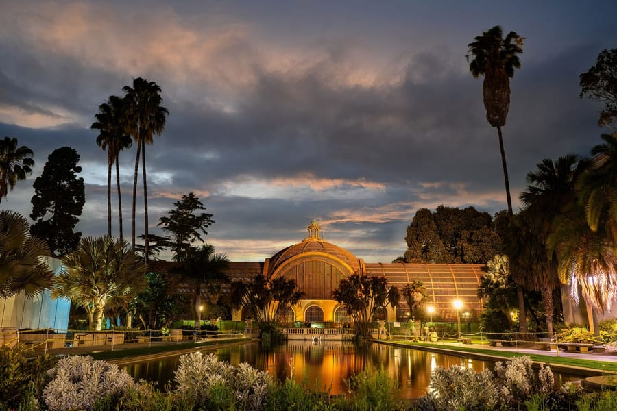 The Botanical Building and reflecting pond at Balboa Park in San Diego at sunset