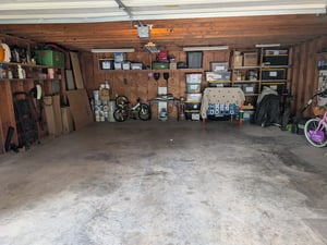 Before: a packed two-car garage in Southwest Houston full of boxes and clutter
