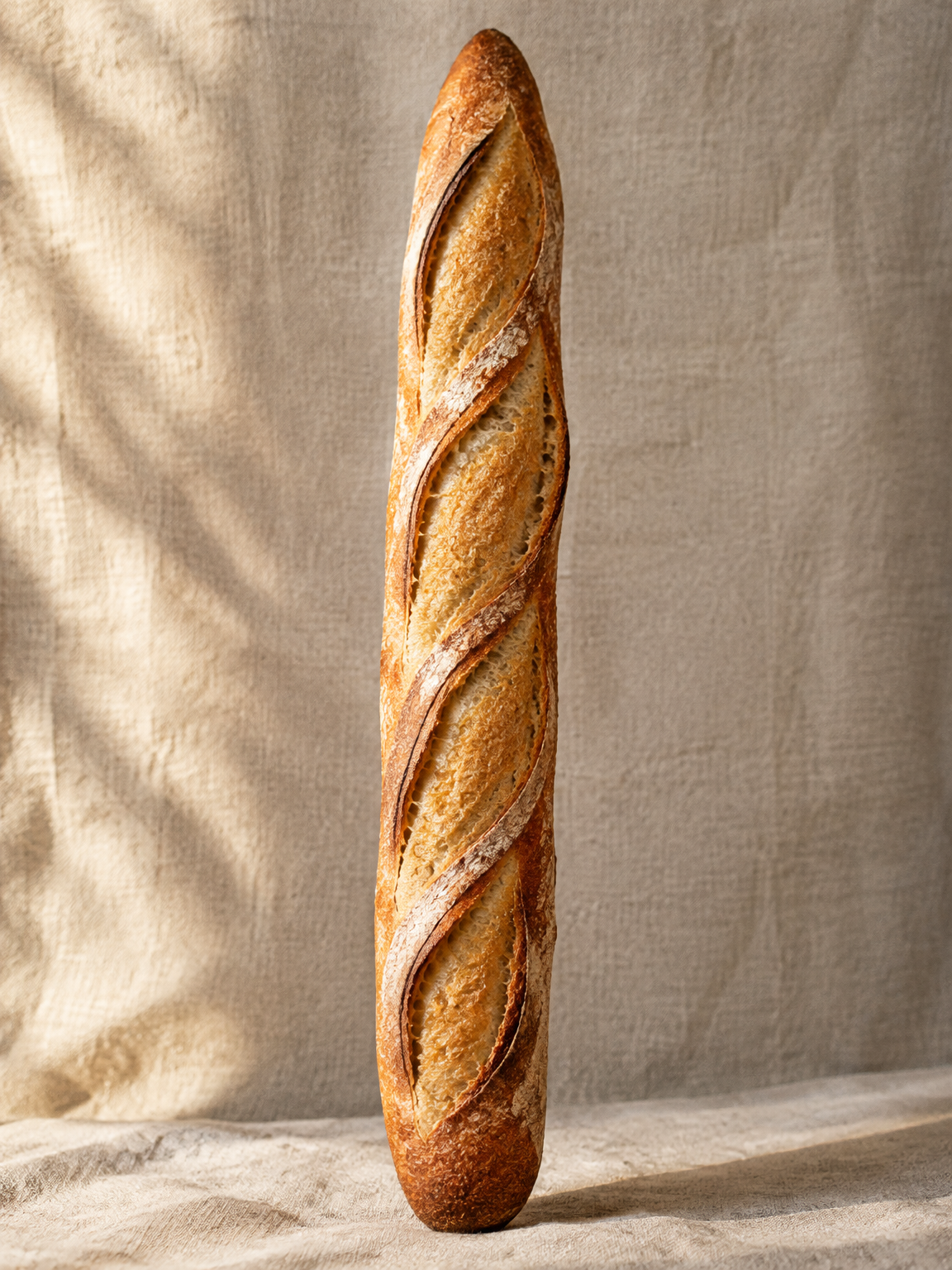 A traditional baguette with a crisp, golden crust