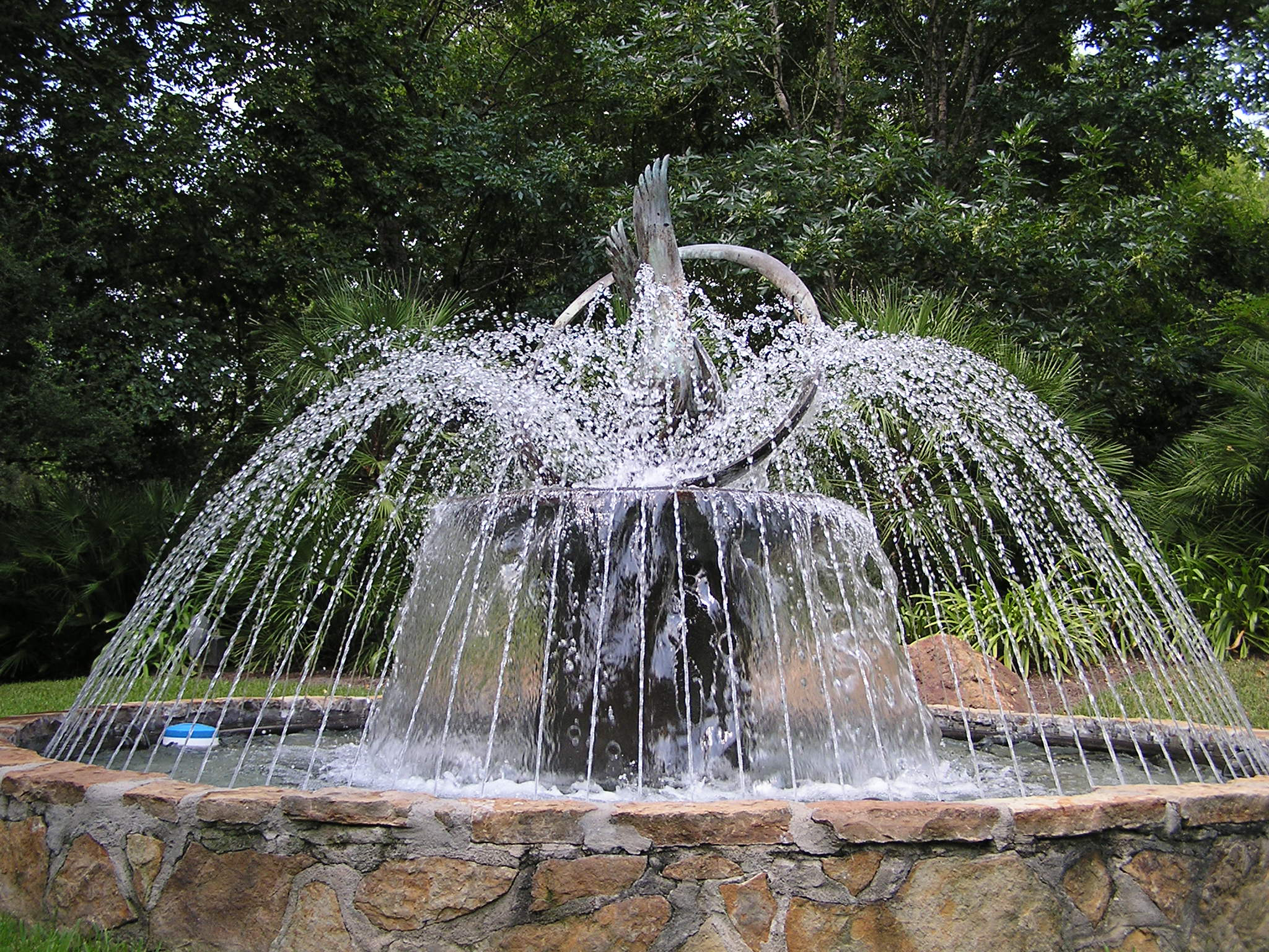 Fountain sculpture with water feature