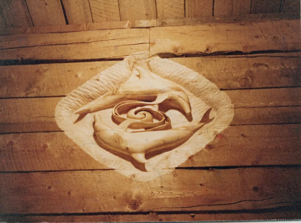 Elegant wood carving with flowing organic forms