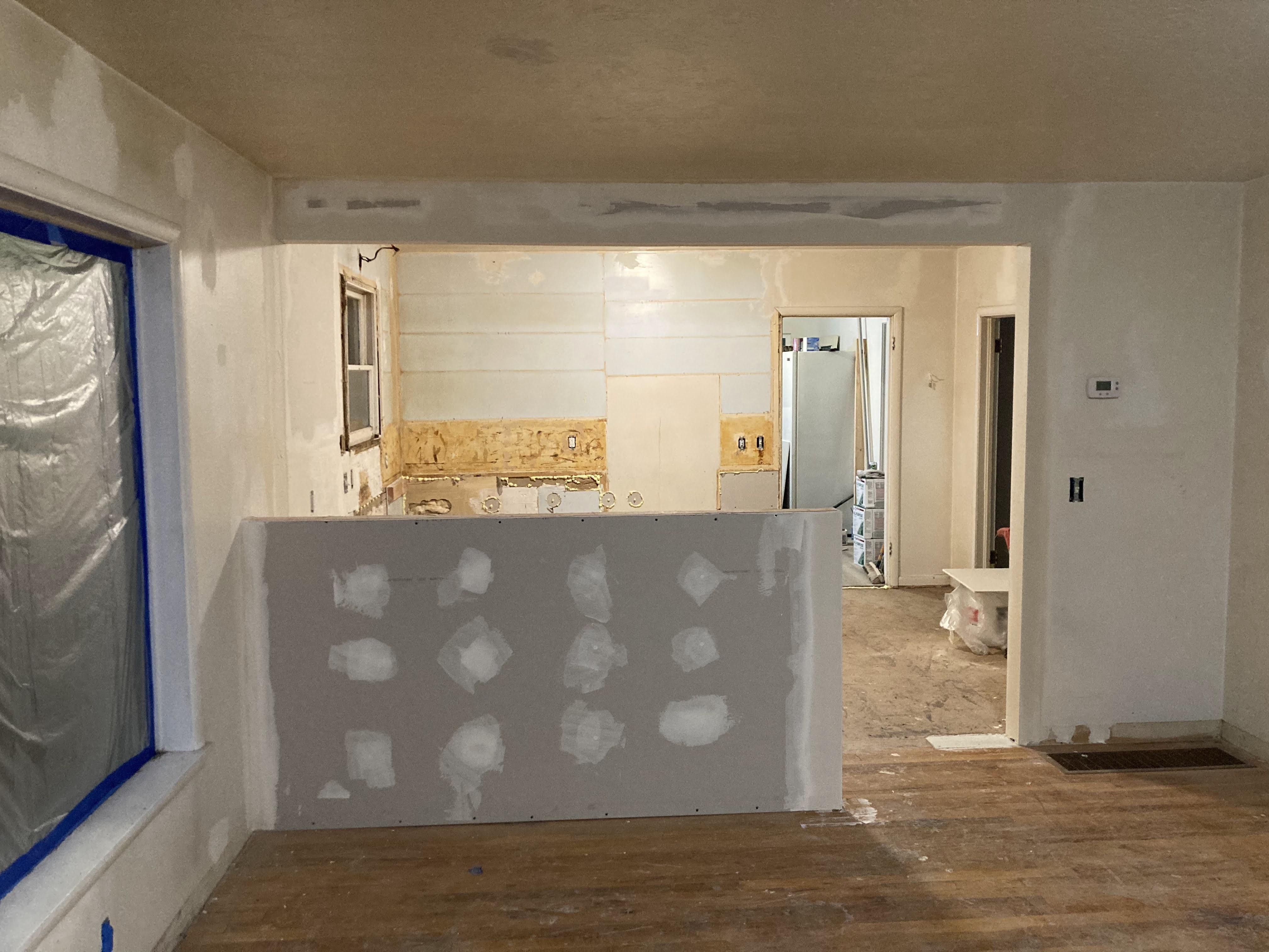 Drywall and framing phase — open floor plan remodel
