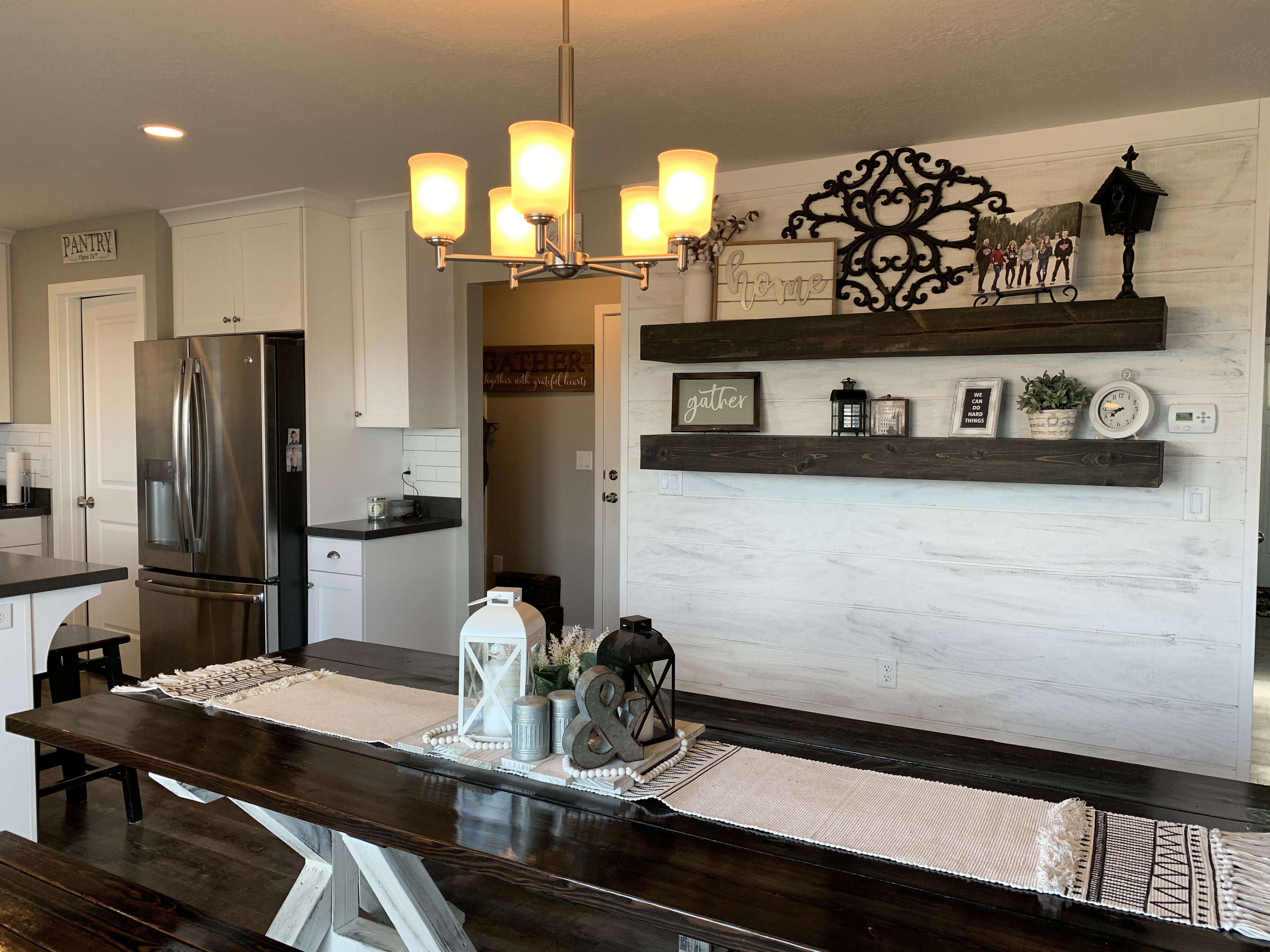 Custom home kitchen and dining room with shiplap accent wall — B&N Construction