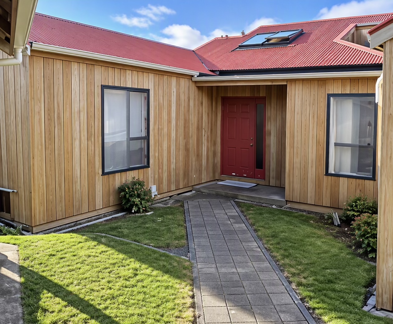 The same courtyard home after preparation, ready for staining