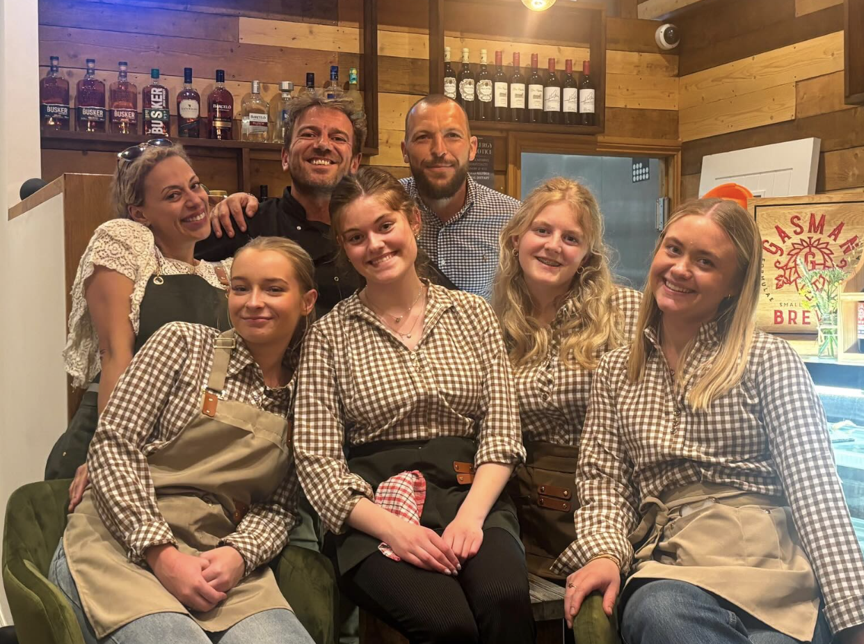The Dovecote Barn team smiling together in the bistro