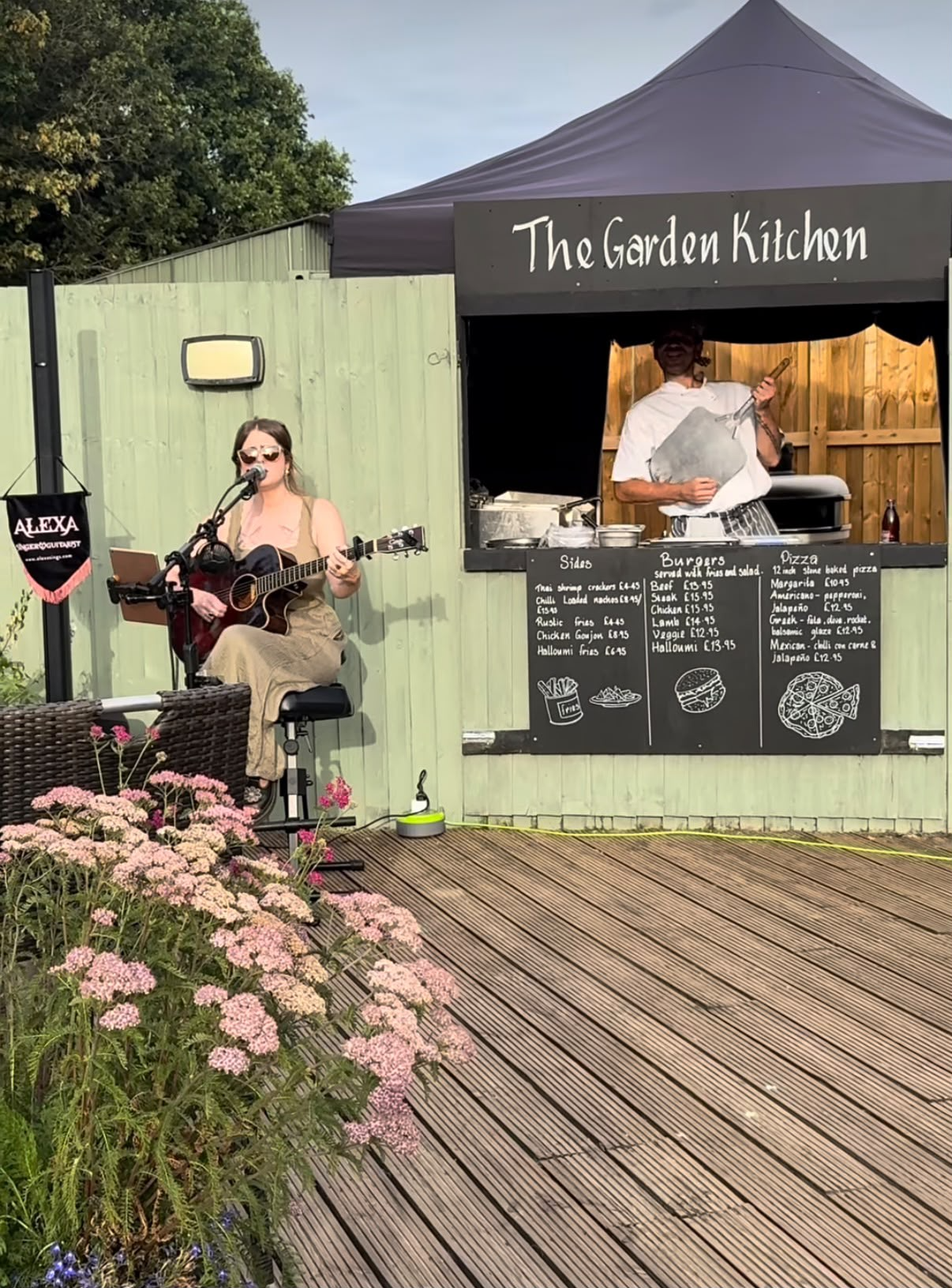 Live acoustic music beside The Garden Kitchen in the bistro garden