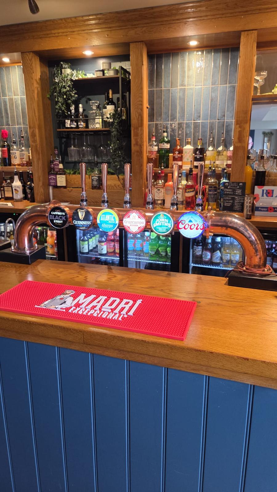 The refurbished bar at The Star Inn, with ale and lager taps, optics and a copper pipe